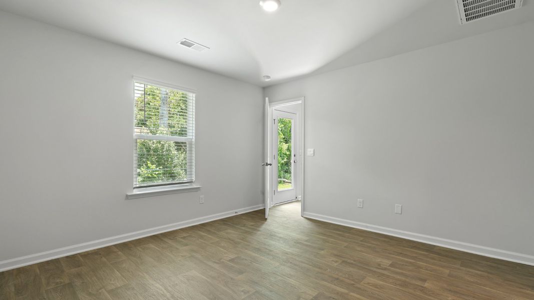Spacious, unfurnished interior of a new home in Pine Hills at Cane Bay, Summerville (Image 20).