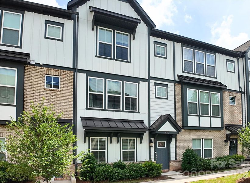 Front exterior of a new home in , Davidson, NC, highlighting curb appeal (Image 24).