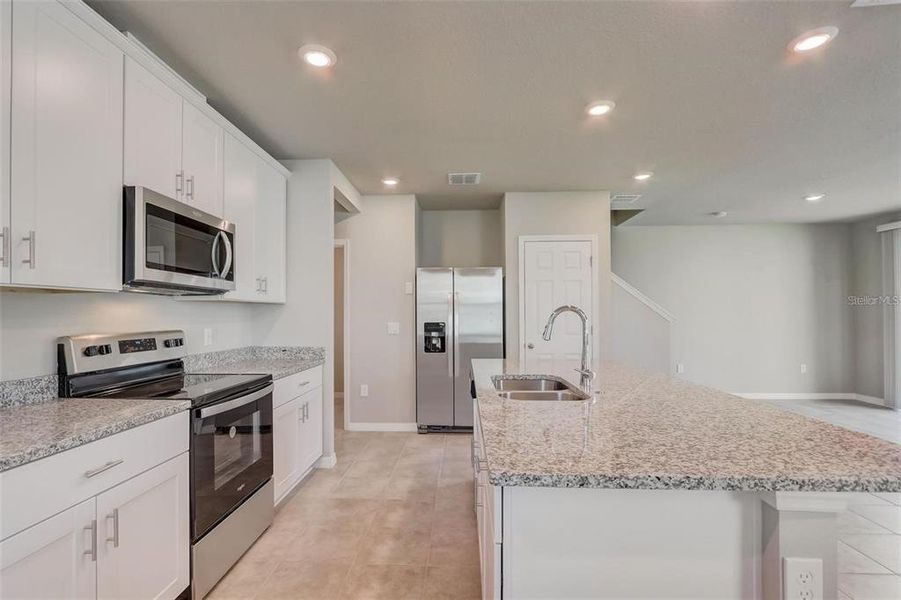 Furnished interior view inside a new home in , Davenport (Image 9).