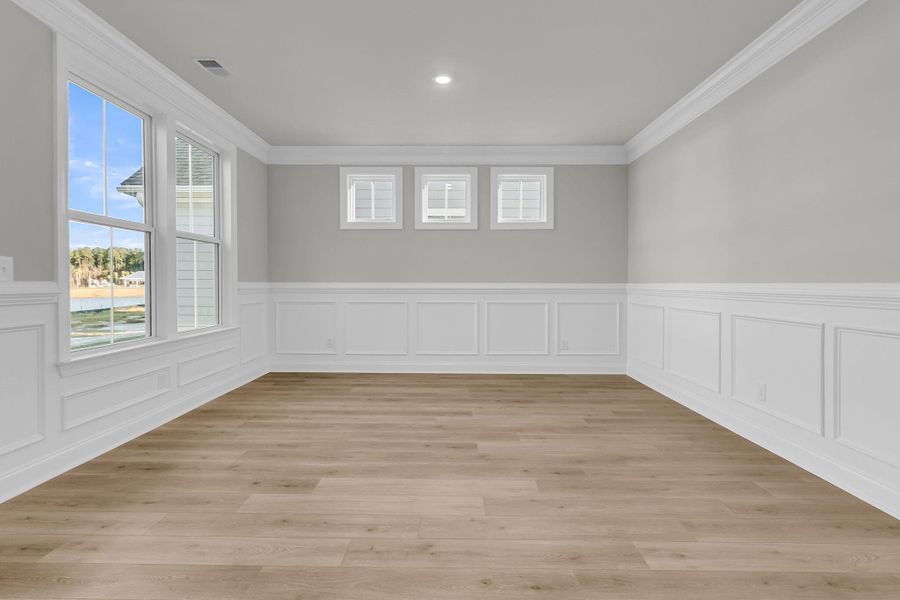 Spacious, unfurnished interior of a new home in Tidewater at Lakes of Cane Bay, Summerville (Image 31).