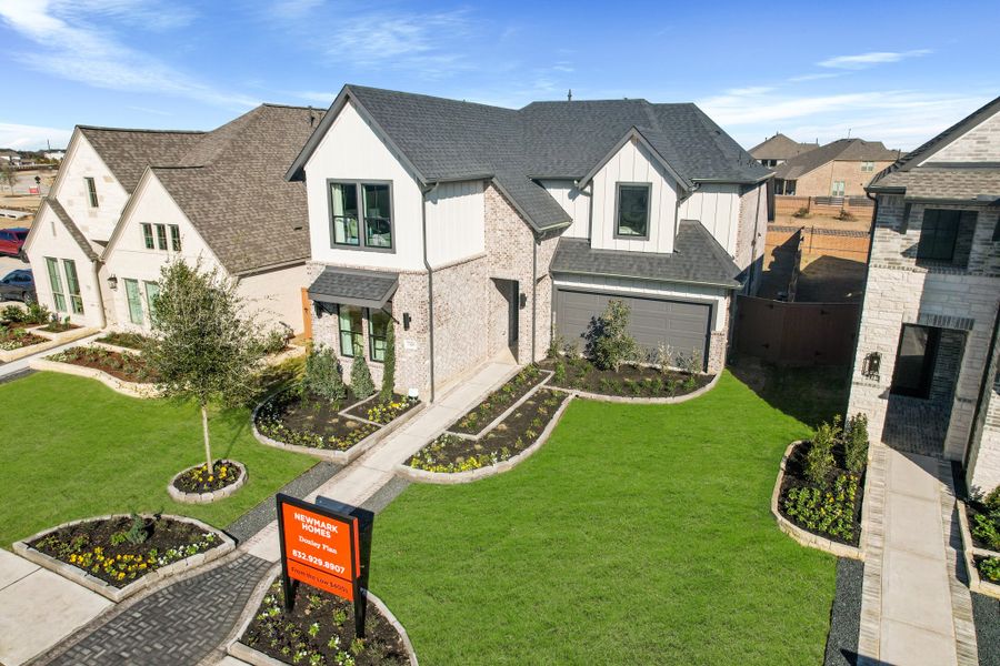 Front exterior of a new home in Elyson 45' & 70', Katy, TX, highlighting curb appeal (Image 24).