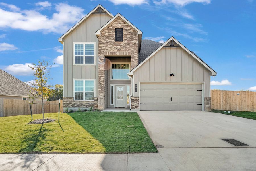 Representative exterior photo of a completed home built from the The 2588 by Stylecraft Builders in Pecan Grove, Navasota, TX (Image 1). Representative exterior photo of a completed home built from the The 2588 by Stylecraft Builders in Pecan Grove, Navasota, TX (Image 1).