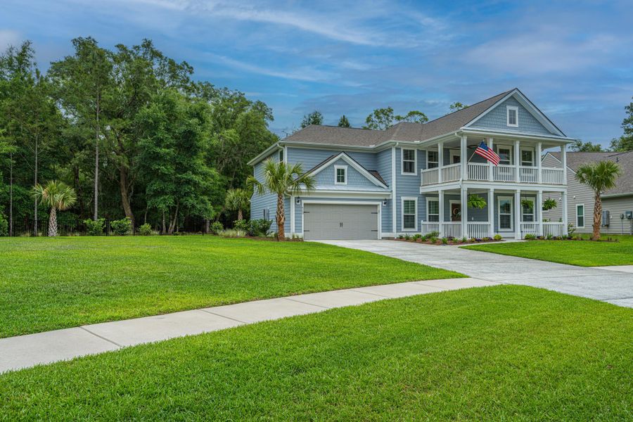 Front exterior of a new home in Sea Island Preserve, Johns Island, SC, highlighting curb appeal (Image 25).