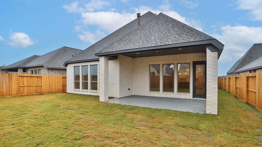 Exterior details and patio area of a home in Riceland, Mont Belvieu (Image 2).