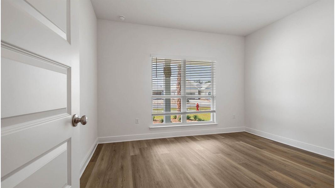 Representative unfurnished interior of a home built from the Delray by D.R. Horton in Caballeros Estates At Hombre, Panama City Beach (Image 19).