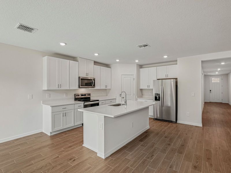 Furnished interior view inside a new home in Salt Meadows - Classic Series, Parrish (Image 5).