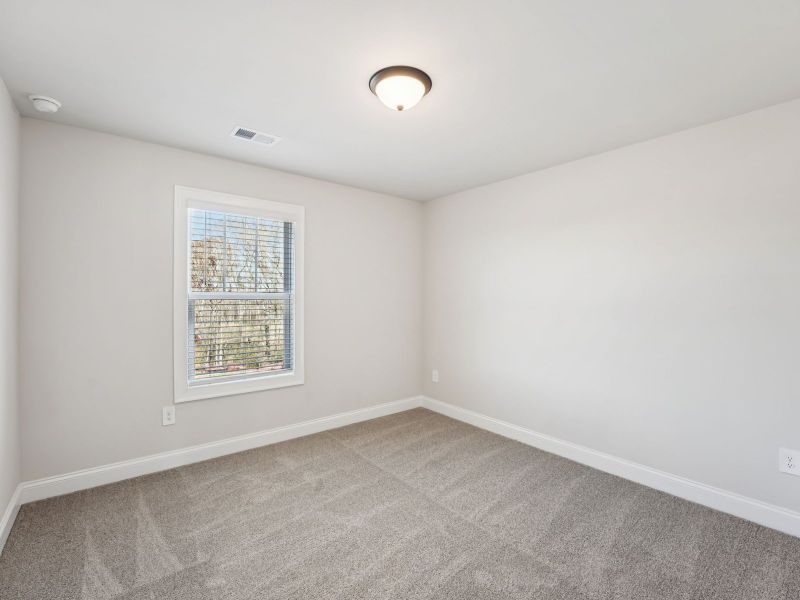 Spacious, unfurnished interior of a new home in Hemingway - Highland Series, Cumming (Image 19).