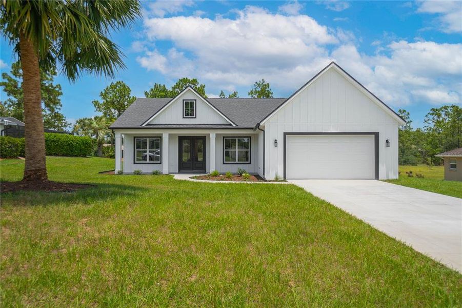 Front exterior of a new home in , Inverness, FL, highlighting curb appeal (Image 30).