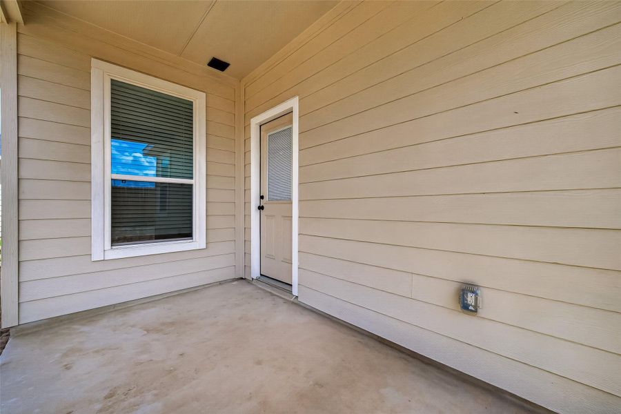 Exterior details and patio area of a home in La Segarra, Brookshire (Image 25).