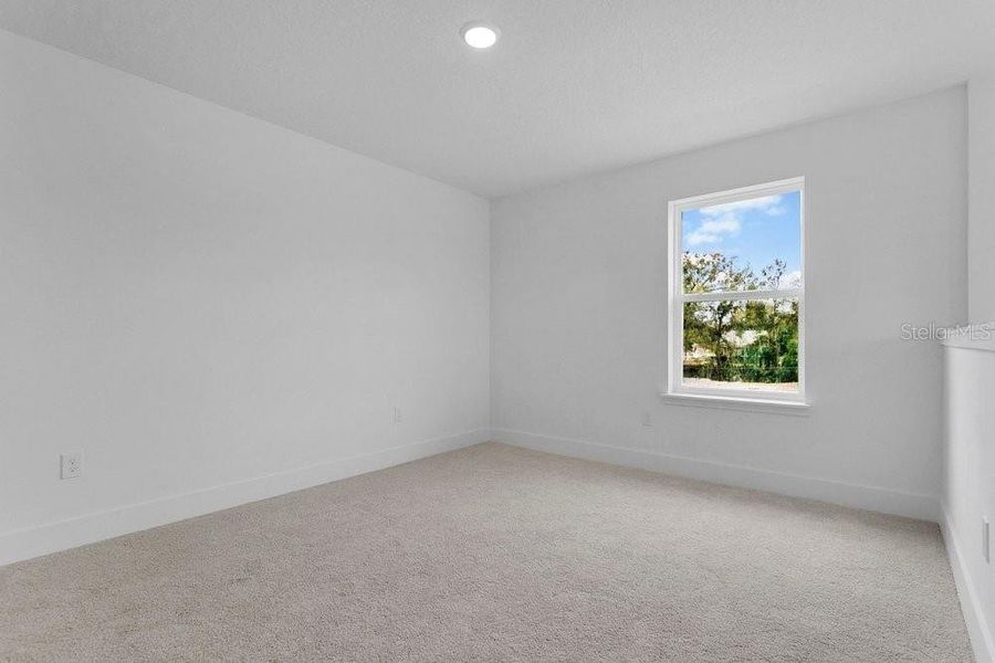 Spacious, unfurnished interior of a new home in Yucatan Gardens, Orlando (Image 27).