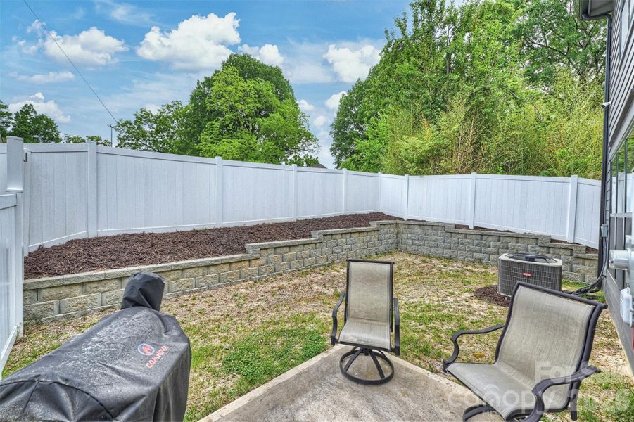 Exterior details and patio area of a home in , Charlotte (Image 3).