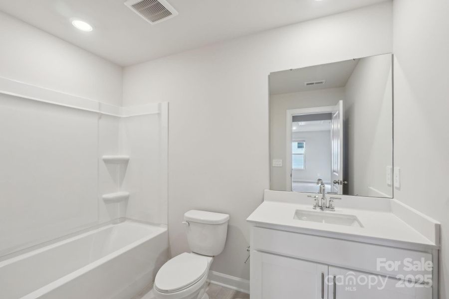 Furnished interior view inside a new home in Walnut Reserve, Conover (Image 7).