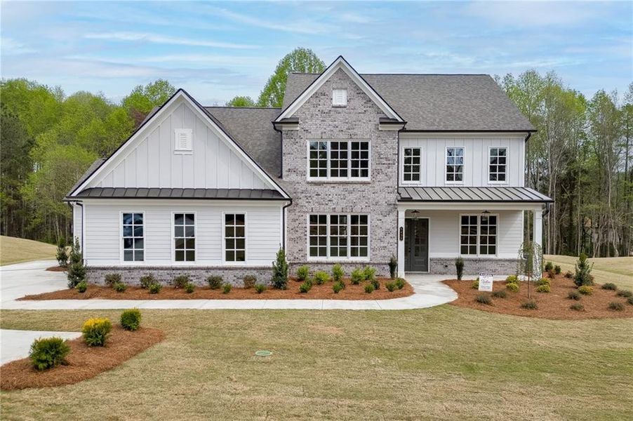 Front exterior of a new home in , Cumming, GA, highlighting curb appeal (Image 28).
