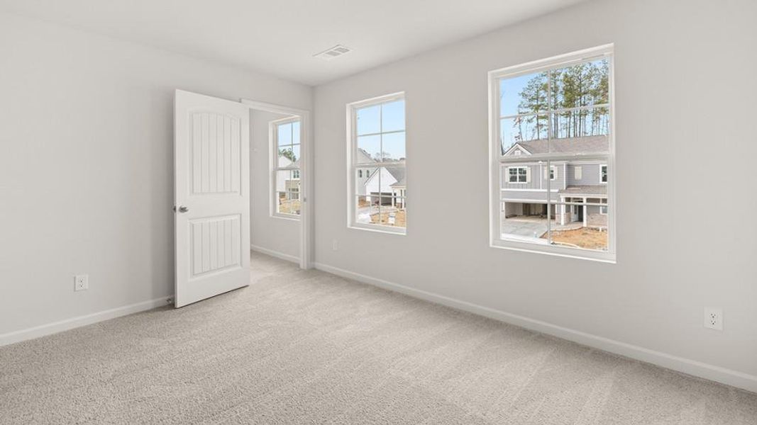 Spacious, unfurnished interior of a new home in Parkside at Carter Grove, Cartersville (Image 24).