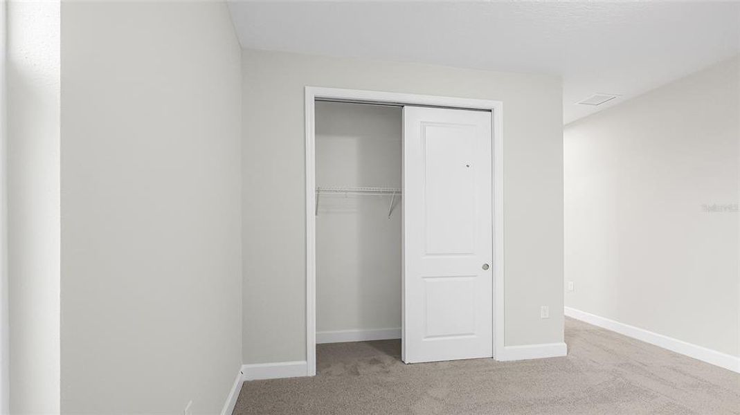 Spacious, unfurnished interior of a new home in Cresswind at Lake Harris, Tavares (Image 32).