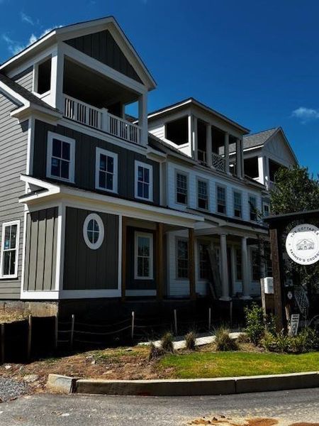 Front exterior of a new home in , Ball Ground, GA, highlighting curb appeal (Image 22).