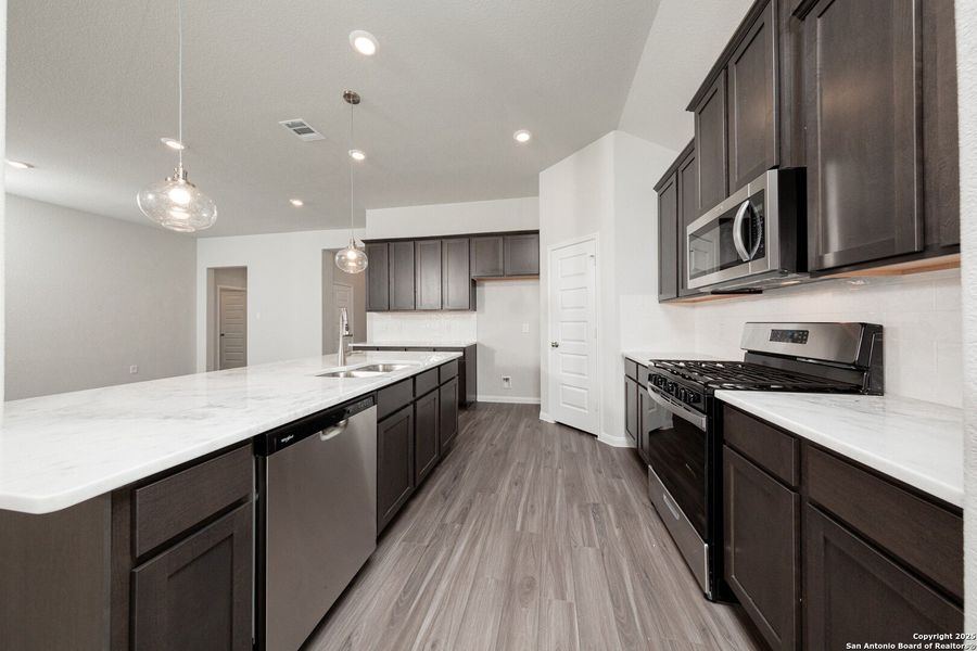 Furnished interior view inside a new home in Cinco Lakes, San Antonio (Image 4).