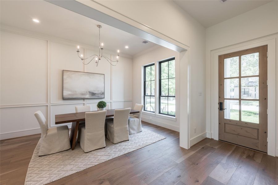 A study in proportion and material defined by clean architectural lines, wide-plank European white oak underfoot, and color drenching that plays with natural light.