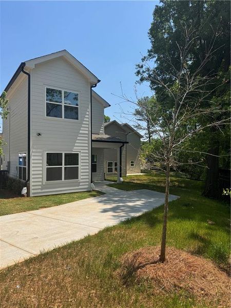 Front exterior of a new home in , Scottdale, GA, highlighting curb appeal (Image 9).
