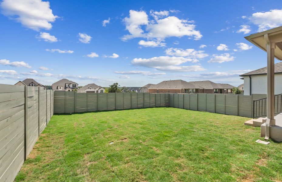 Exterior details and patio area of a home in Wolf Ranch, Georgetown (Image 4).