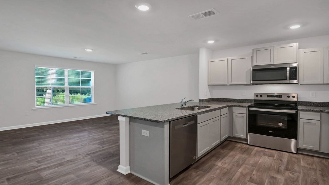 Furnished interior view inside a new home in Hunter's Branch Townhomes, Hopkins (Image 7).