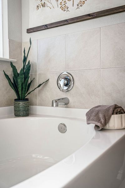 This is the primary bathroom of the Hawkins plan and is the model home in Carillon at 13305 Eppright Trace Blvd., Manor, TX. This is the primary bathroom of the Hawkins plan and is the model home in Carillon at 13305 Eppright Trace Blvd., Manor, TX.