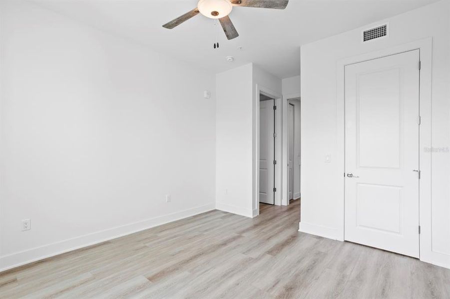 Spacious, unfurnished interior of a new home in Residences at Town Center, Madeira Beach (Image 21).