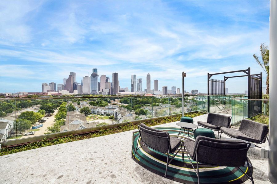Private outdoor seating areas offering beautiful views of downtown Houston. Private outdoor seating areas offering beautiful views of downtown Houston.