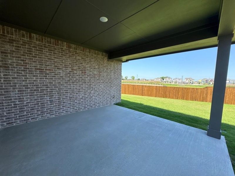 Exterior details and patio area of a home in Cedar Ridge Estates, Anna (Image 4).