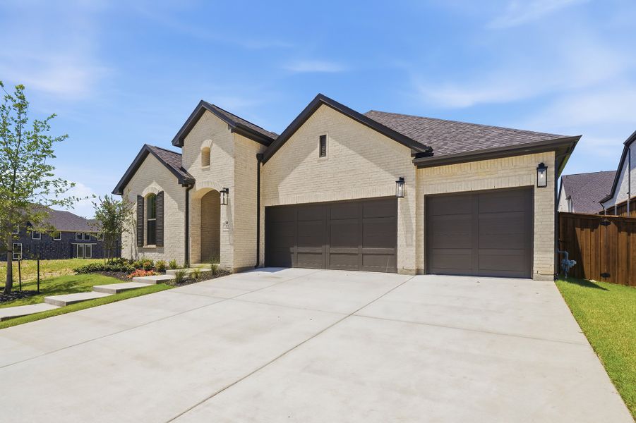 Front exterior of a new home in Custer Ridge Estates, Allen, TX, highlighting curb appeal (Image 24). Front exterior of a new home in Custer Ridge Estates, Allen, TX, highlighting curb appeal (Image 24).