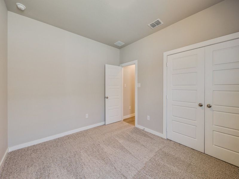 Representative unfurnished interior of a home built from the Roswell by Hakes Brothers in Hunters Ranch, San Antonio (Image 21).