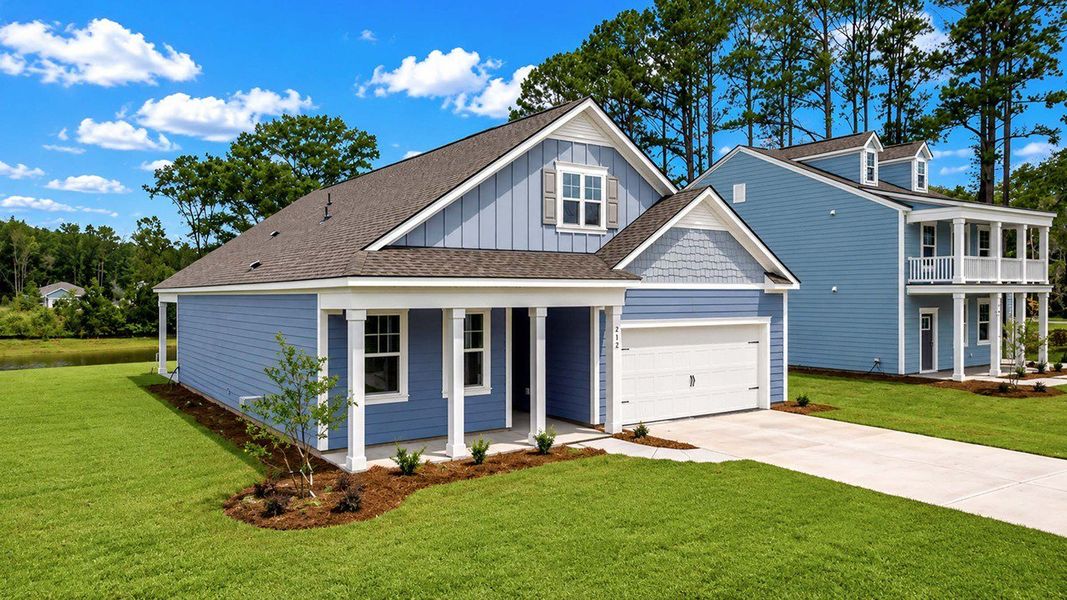 Front exterior of a new home in Rivers Reach, Yemassee, SC, highlighting curb appeal (Image 2). Front exterior of a new home in Rivers Reach, Yemassee, SC, highlighting curb appeal (Image 2).