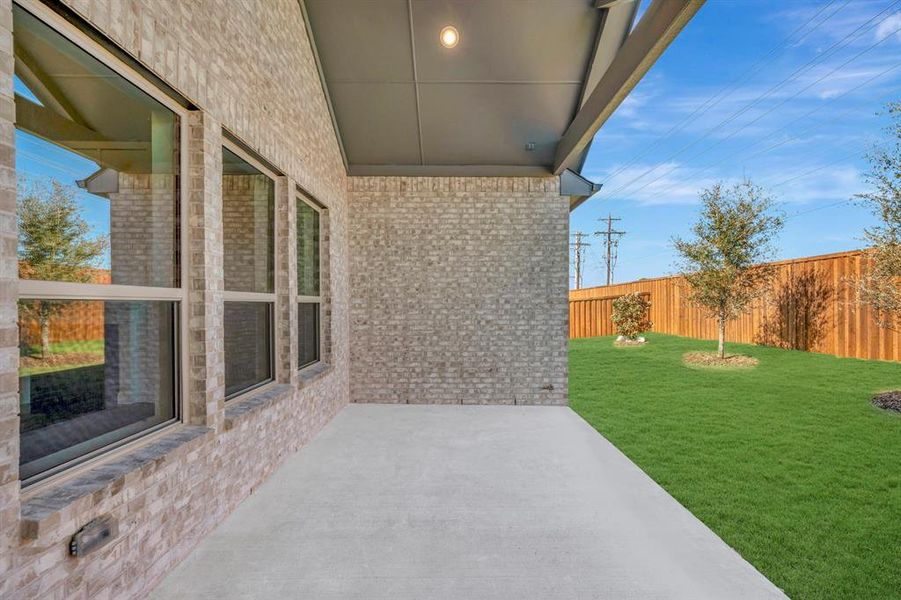 Exterior details and patio area of a home in Kreymer at the Park, Wylie (Image 2).