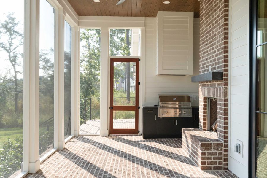 Exterior details and patio area of a home in , Ravenel (Image 35).