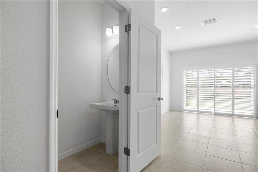 Furnished interior in a model home at The Townhomes at Azario Lakewood Ranch in Bradenton (Image 15).