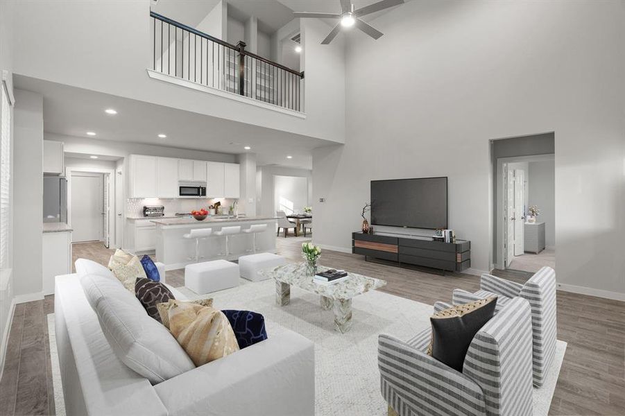 Bring your loved ones and guests together in the inviting living room! Boasting lofty high ceilings, recessed lighting, a stylish ceiling fan, custom paint, stunning flooring, and expansive windows that flood the space with ample natural light all day long. Virtual Staged.