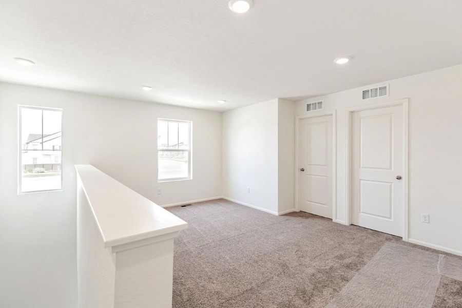 Spacious, unfurnished interior of a new home in Sky Ranch Villas, Watkins (Image 16).