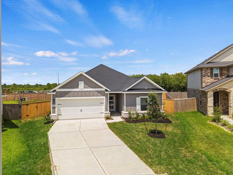 Front exterior of a new home in Laurel Landing, Alvin, TX, highlighting curb appeal (Image 19).