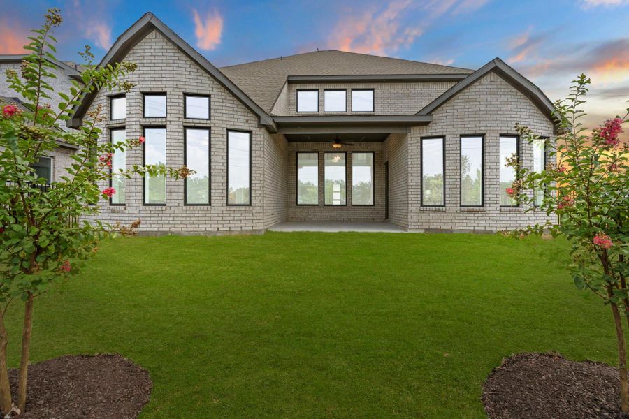 Exterior details and patio area of a home in Bridgeland, Cypress (Image 25).