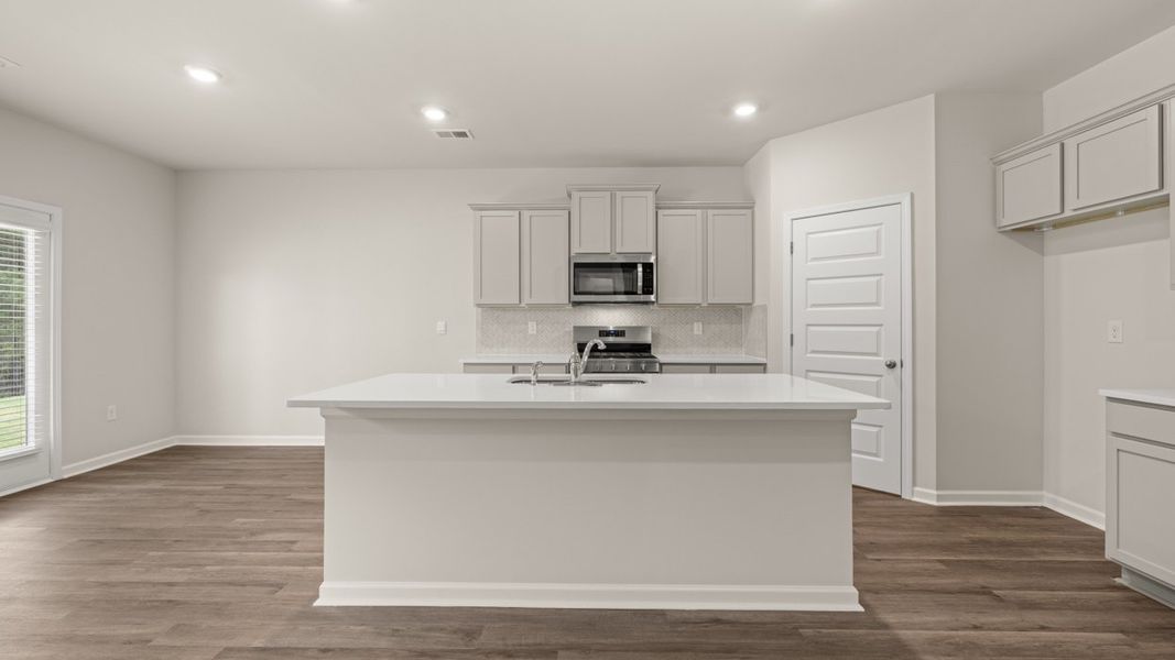 Furnished interior view inside a new home in Preserve at Dove Creek, Statham (Image 4).