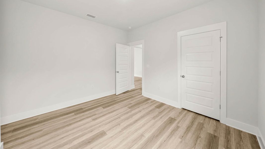 Spacious, unfurnished interior of a new home in WindMark Beach, Port Saint Joe (Image 12).