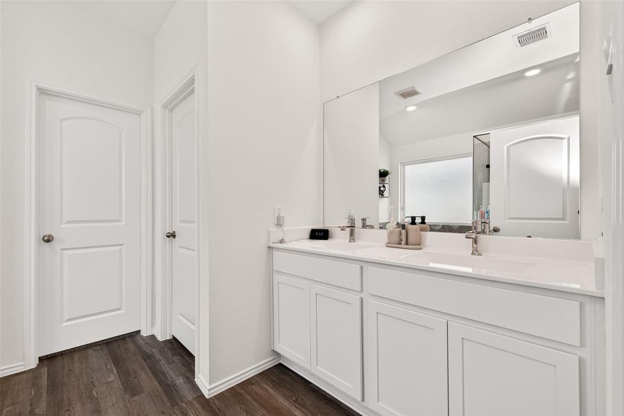 Furnished interior view inside a new home in Sunterra, Katy (Image 12).