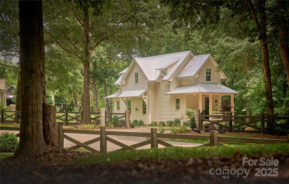 Front exterior of a new home in , Fort Mill, SC, highlighting curb appeal (Image 1). Front exterior of a new home in , Fort Mill, SC, highlighting curb appeal (Image 1).