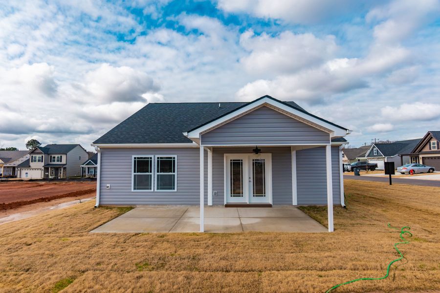 Representative exterior photo of a completed home built from the Clifton by Enchanted Homes in Hampshire Heights, Moore, SC (Image 28).