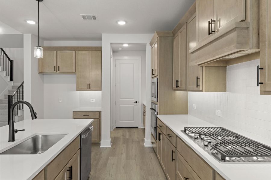 Furnished interior view inside a new home in Union Park, Little Elm (Image 9).