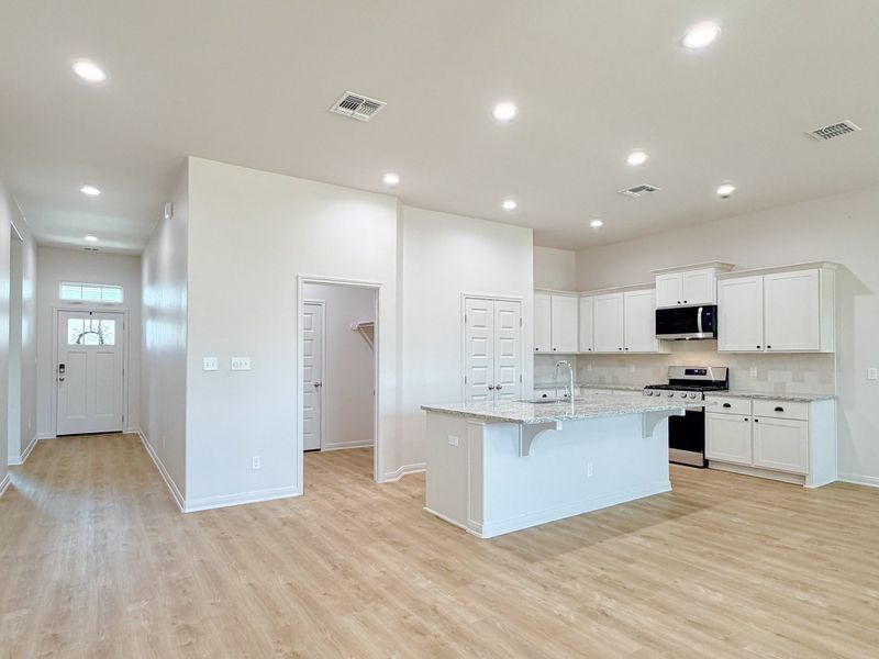 Furnished interior view inside a new home in TerraVista, Victoria (Image 8).