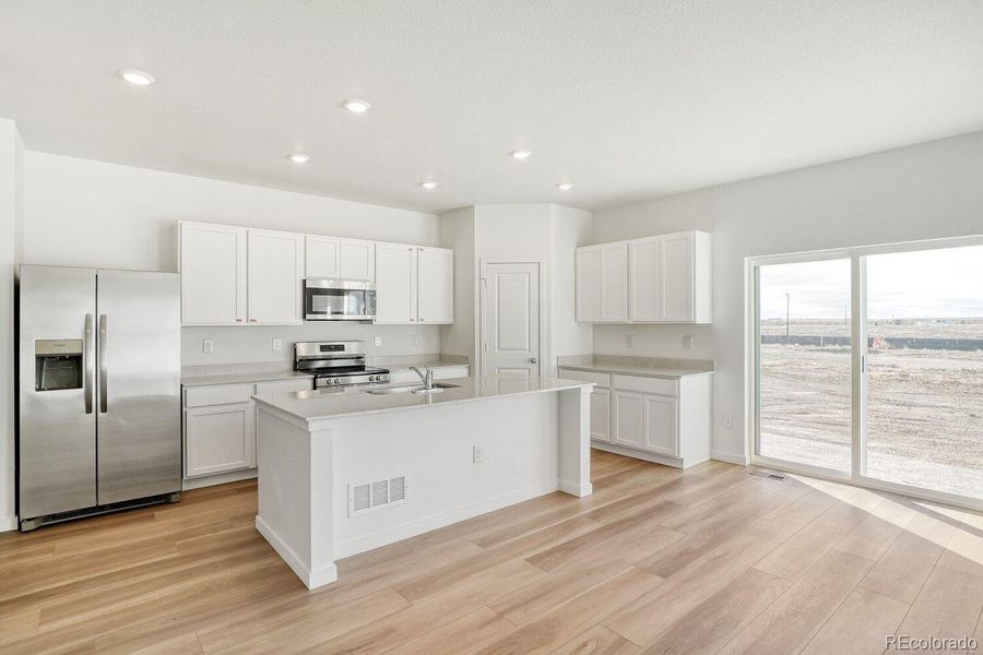 Furnished interior view inside a new home in Muegge Farms, Bennett (Image 7).
