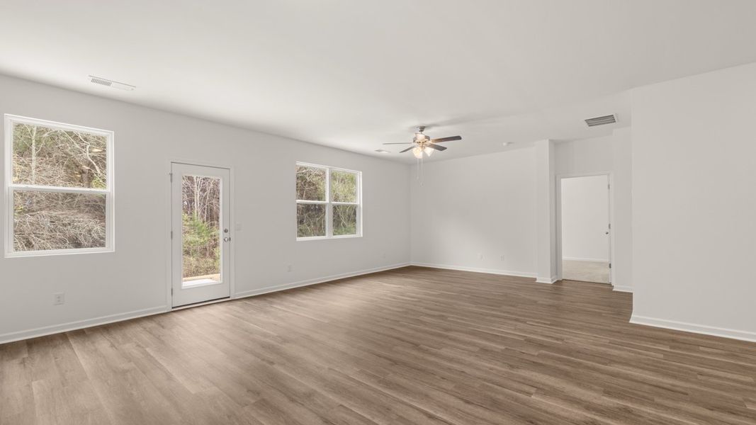 Representative unfurnished interior of a home built from the Cali by D.R. Horton in The Reserve at Calcutta, Stockbridge (Image 12).