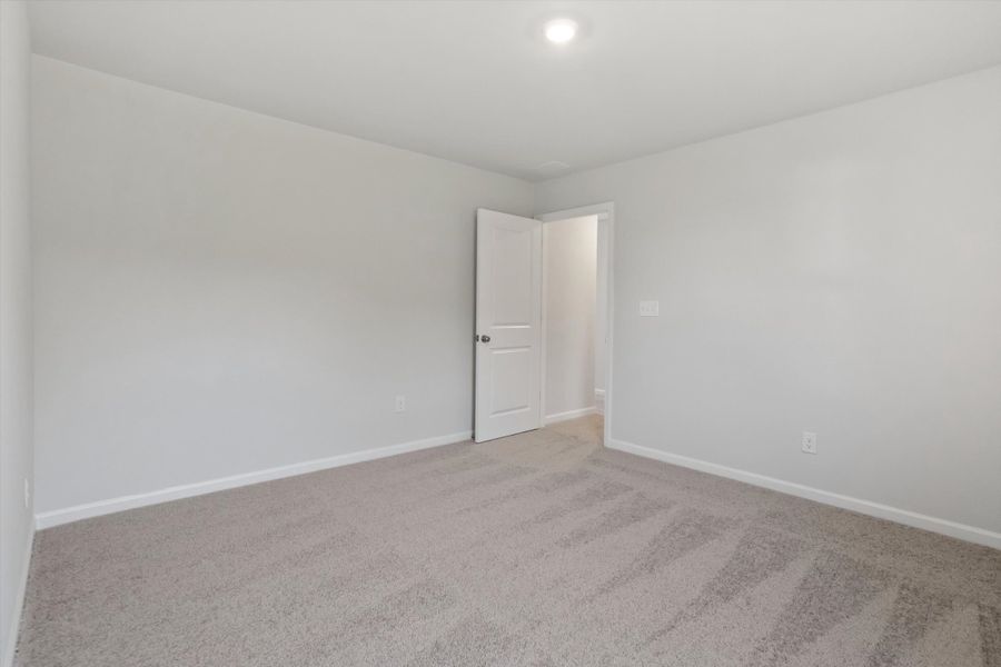 Spacious, unfurnished interior of a new home in Cambridge Reserve, Angier (Image 28).
