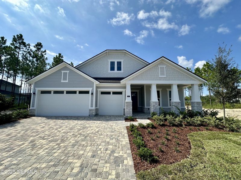 Front exterior of a new home in SilverLeaf, St. Augustine, FL, highlighting curb appeal (Image 14).